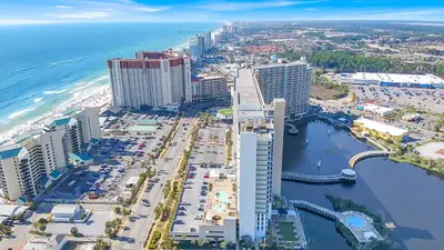 an aerial view of the beach and buildings at Blue Turtle at Laketown in Panama City Beach