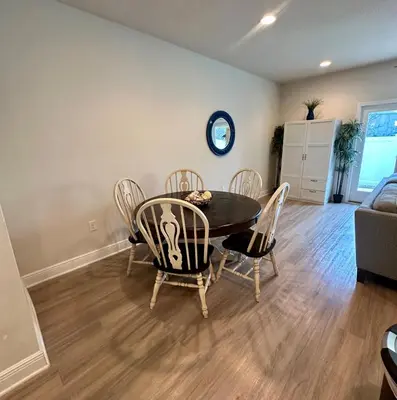 a dining room with a table and chairs at Florida Knights by the Sea in Panama City Beach