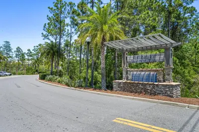 a bus stop on the side of a road at Florida Knights by the Sea in Panama City Beach