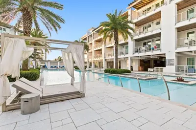 a hotel with a swimming pool and a hotel at The Pointe 333 in Inlet Beach