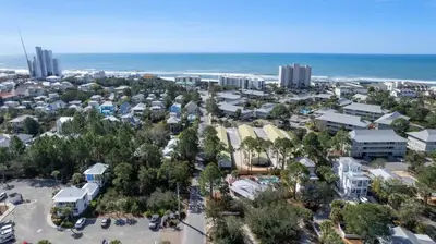an aerial view of a city with the ocean at Tutti Frutti in Santa Rosa Beach