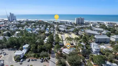 an aerial view of a city with the ocean at Tutti Frutti in Santa Rosa Beach