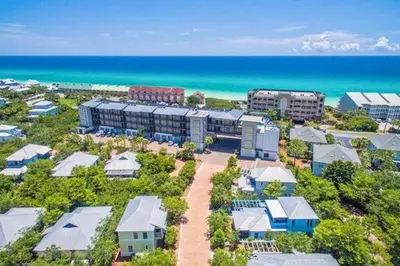 an aerial view of a resort next to the ocean at The Grey Gull in Inlet Beach