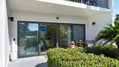 an outside view of a house with sliding glass doors at Emerald Hill 35 in Santa Rosa Beach
