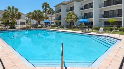 a large swimming pool in front of a building at Emerald Hill 35 in Santa Rosa Beach