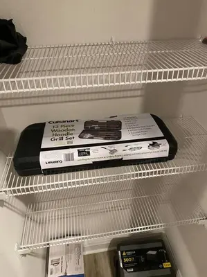 a book sitting on a shelf in a refrigerator at PCB Townhome in Panama City Beach