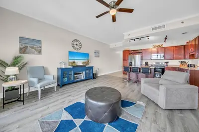 a large living room with a couch and a table at Laketown Wharf 2135 in Panama City Beach