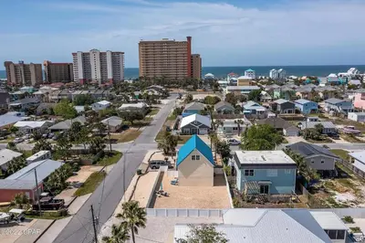 an aerial view of a city with houses and the ocean at Coastal Bliss in Panama City Beach
