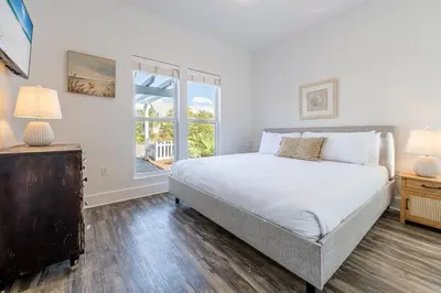 a bedroom with a bed and a window at 30A Lemon Shello in Seacrest