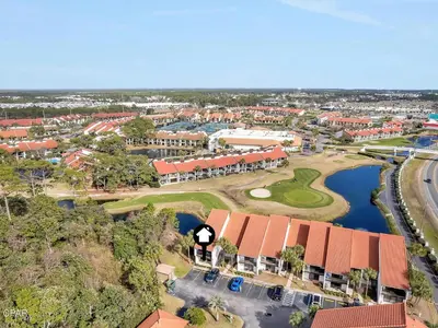 an aerial view of a resort with a golf course at Edgewater Golf Villa 3101 in Panama City Beach