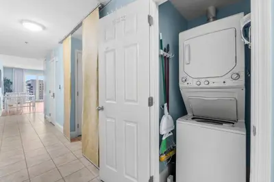 a laundry room with a washer and dryer at Laketown Wharf #0804 in Panama City Beach