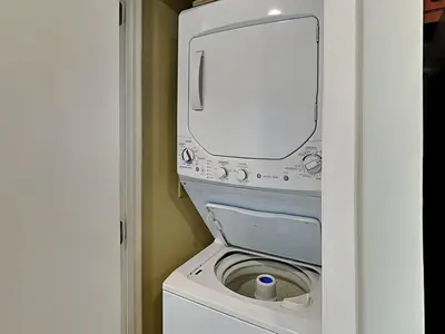 a washer and dryer in a small room at Edgewater Tower II #209 in Panama City Beach