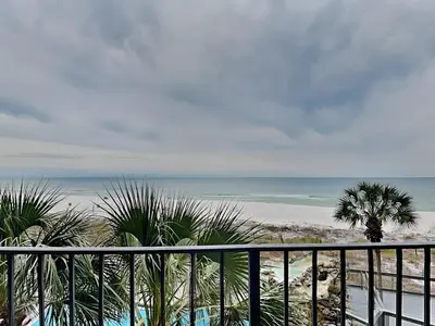 a view of the beach from a balcony at Edgewater Tower II #209 in Panama City Beach