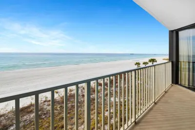 a balcony with a view of the beach at Edgewater Leeward #307 in Panama City Beach