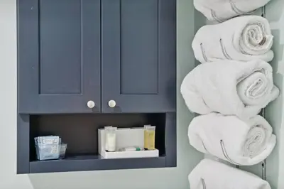a bunch of towels are stacked in a bathroom at Pineapple Paradise, Beach Front, Newly Renovated, Sleeps 6 in Panama City Beach