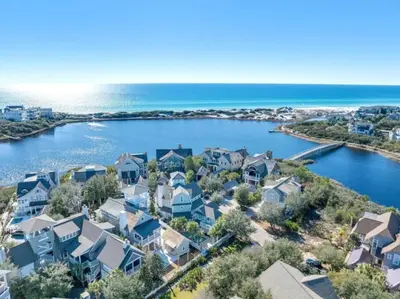 an aerial view of a subdivision of houses next to the water at Watersound 13 - Hosted by Top Villas in Watersound Beach