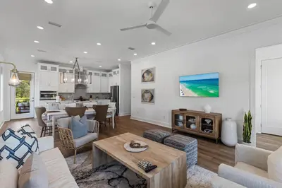 a living room with a couch and a table at Community Pool, Close to Beach, Great Location! in Inlet Beach