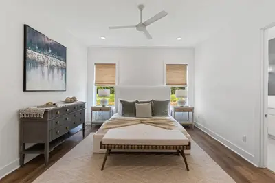 a white bedroom with a bed and a dresser at Community Pool, Close to Beach, Great Location! in Inlet Beach