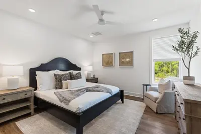 a bedroom with a bed and a desk and a chair at Community Pool, Close to Beach, Great Location! in Inlet Beach