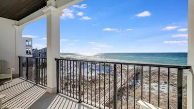 a balcony with a view of the ocean at Azzurro Moon in Seagrove Beach