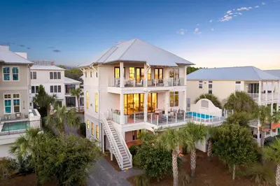 an aerial view of a house with palm trees at Gulf Shore Manor in Santa Rosa Beach