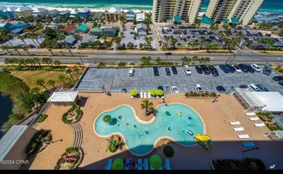 an aerial view of a pool in a parking lot at Panama City -3 Bedroom - Laketown Wharf in Panama City Beach