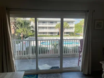 an open window with a view of a balcony at Beachwood Villas 10E in Santa Rosa Beach