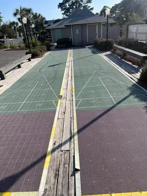 an empty tennis court with a basketball court at Beachwood Villas 10E in Santa Rosa Beach