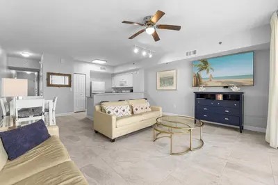 a living room with a couch and a table at Shores Of Panama #1826 in Panama City Beach