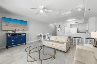 a living room with a couch and a table at Shores Of Panama #1927 in Panama City Beach