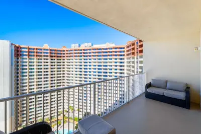 a balcony with a view of a large building at Shores Of Panama #1927 in Panama City Beach