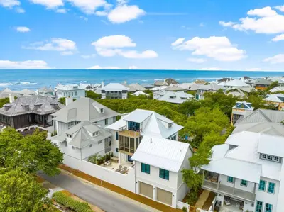 an aerial view of a residential neighborhood with white houses at Chloe's Cottage and Carriage House in Rosemary Beach