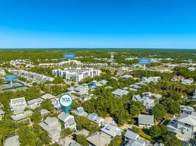 an aerial view of a city with a geo sign and condos at Abaco Pearl Carriage House in Rosemary Beach