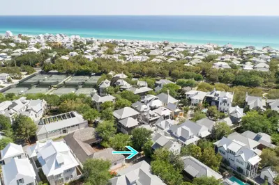 an aerial view of a city with houses and the ocean at PTO Carriage House in Rosemary Beach