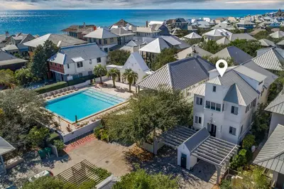 an aerial view of a home with a swimming pool at Gates Cottage in Rosemary Beach