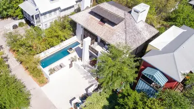 an overhead view of a house with a swimming pool at Astley Cottage in Rosemary Beach