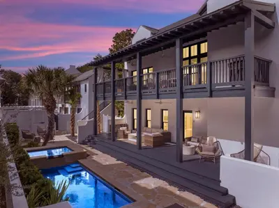 an image of a house with a swimming pool at Acqua Cottage & Carriage House in Rosemary Beach