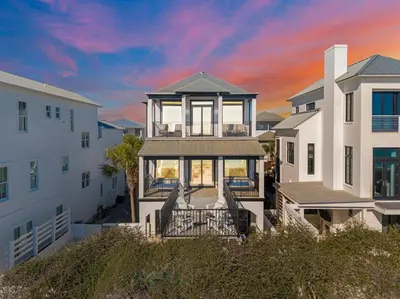 an aerial view of a house with a sunset at Wilder Dreams in Seacrest