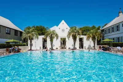 a large swimming pool in front of a building at Blue Oak in Rosemary Beach
