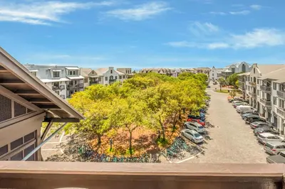 an aerial view of a parking lot at a apartment complex at Blue Oak in Rosemary Beach