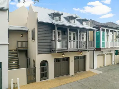 an image of a house with a garage at Terra Casa Cottage & Carriage House in Rosemary Beach