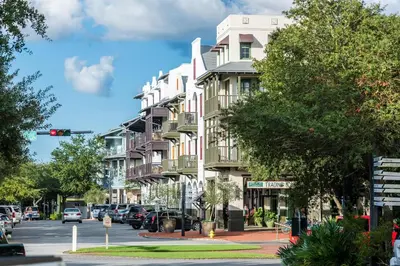 a building on a city street with a traffic light at Just Breathe Flat in Rosemary Beach