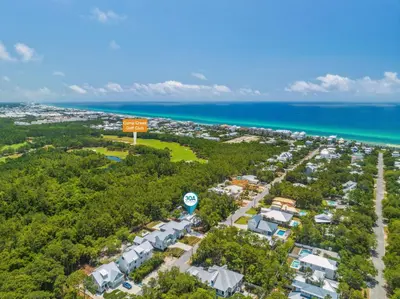 an aerial view of a resort with the ocean at Moon Tide in Seacrest