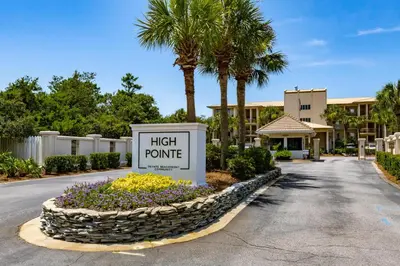 a sign that reads high promise in a street at High Pointe 44W in Seacrest