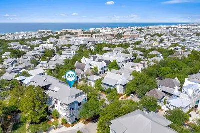 an aerial view of a city with houses and the ocean at Thyme & Place in Rosemary Beach