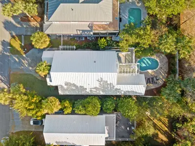 an overhead view of a row of white roofs at Sugar Sand Retreat – 3-Bed, 2-Bath Beach Getaway with Private Pool, Sleeps 8! in Santa Rosa Beach