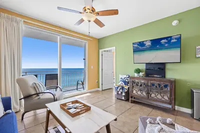 a living room with a view of the ocean at Anchor's Way! Come Visit Our Beautiful 2 BR, 2BA Oceanfront Retreat! Sleeps 6! in Panama City Beach
