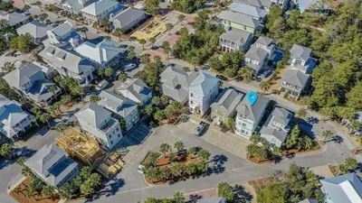 an overhead view of a city with houses and trees at 30A Emerald Waters by AvantStay Pool Bikes Bonfires in Panama City Beach