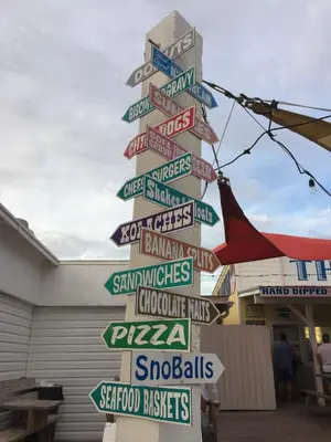 a street sign with many different signs on it at Charming 3-bedroom home in beautiful Panama City in Panama City