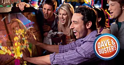 a group of people playing a video game at Dreamscape 30! Luxury Beach Front Property! in Panama City Beach
